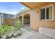 Enclosed backyard and a view into the 2 car garage with an open overhead door at 2050 Island Walk Dr, Orlando, FL 32824