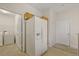 Kitchen featuring a view into the laundry room and modern appliances at 2050 Island Walk Dr, Orlando, FL 32824