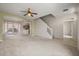 Spacious living room featuring a ceiling fan and an archway at 2050 Island Walk Dr, Orlando, FL 32824
