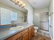 Bathroom with a glass shower and vanity; neutral walls, light and airy at 2054 Hammock Moss Dr, Orlando, FL 32820