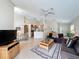 Inviting living room features tile flooring, high ceilings, and an open floorplan at 2649 Hemingway Ave, Haines City, FL 33844