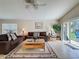 Inviting living room with a comfortable seating arrangement and bright natural light at 2649 Hemingway Ave, Haines City, FL 33844
