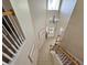 Bright foyer with tile flooring, staircase, chandelier, and high ceilings creating an open space at 2735 Scarborough Dr, Kissimmee, FL 34744