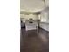 Bright kitchen with white cabinets, stainless steel appliances, and a center island at 2813 Roseglen Way, Orlando, FL 32812