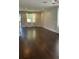Spacious living room featuring hardwood floors, recessed lighting, and large windows at 2813 Roseglen Way, Orlando, FL 32812