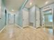 Inviting entryway with tile flooring and neutral-colored walls at 2839 Harmonia Hammock Rd, Harmony, FL 34773