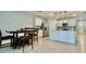 Stylish kitchen with stainless steel appliances and island seating at 2839 Harmonia Hammock Rd, Harmony, FL 34773