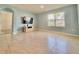 Spacious living room with tile flooring and bright natural light at 2839 Harmonia Hammock Rd, Harmony, FL 34773
