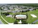 Aerial view of community amenities including pool, playground and volleyball court at 2924 White Cedar Cir, Kissimmee, FL 34741