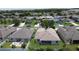 Scenic aerial view highlighting the home's backyard, neighborhood, and lush landscaping at 2924 White Cedar Cir, Kissimmee, FL 34741