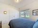 Bright bedroom features a double closet and window that provides natural light at 2924 White Cedar Cir, Kissimmee, FL 34741
