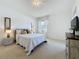 Bright bedroom with neutral tones, and serene natural light at 2924 White Cedar Cir, Kissimmee, FL 34741