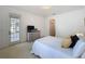 Bright bedroom with walk-out and dresser at 2924 White Cedar Cir, Kissimmee, FL 34741