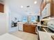 Bright kitchen featuring wooden cabinets, and stainless steel appliances at 2924 White Cedar Cir, Kissimmee, FL 34741