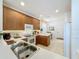 Well-lit kitchen with white countertops, and wood cabinets featuring modern appliances at 2924 White Cedar Cir, Kissimmee, FL 34741
