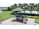 Modern playground with slides, rock climbing and shade cover for fun in the community at 2924 White Cedar Cir, Kissimmee, FL 34741