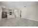 Bright and spacious living room featuring tile floors and neutral decor, perfect for relaxation and entertaining guests at 2966 Aqua Virgo Loop # 16, Orlando, FL 32837