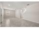 Spacious living room featuring tile flooring and abundant natural light, creating a welcoming atmosphere at 2966 Aqua Virgo Loop # 16, Orlando, FL 32837