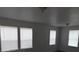 Well-lit bedroom with multiple windows, providing ample natural light at 3029 Azalea Ave, Lake Wales, FL 33898