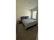 A calming bedroom with a plush bed, soft lighting, and a serene atmosphere, perfect for unwinding at 30346 Armenia Rd, Leesburg, FL 34748