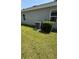 Home exterior features a modern HVAC system with lush landscaping at 30346 Armenia Rd, Leesburg, FL 34748
