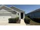Inviting home exterior with lush landscaping and a well-manicured front yard at 30346 Armenia Rd, Leesburg, FL 34748