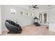 Bonus room featuring a ceiling fan, natural light, and ample space perfect for a workout or recreation area at 3310 Cat Brier Trl, Harmony, FL 34773