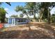 Large backyard with lots of room to roam behind the home at 410 Kentia Rd, Casselberry, FL 32707