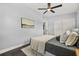 Bedroom with a closet, artwork and hardwood flooring, great for relaxing at 410 Kentia Rd, Casselberry, FL 32707