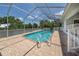Enjoy Florida living with this screened pool and patio area for entertaining at 415 Smiley Ct, Winter Haven, FL 33884