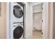 Modern laundry area and bathroom with new washer and dryer at 4768 Tangerine Ave # 4768, Winter Park, FL 32792
