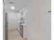 Modern kitchen featuring stainless steel appliances and white cabinetry at 4768 Tangerine Ave # 4768, Winter Park, FL 32792