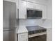 Modern kitchen featuring stainless steel appliances and quartz countertops at 4768 Tangerine Ave # 4768, Winter Park, FL 32792