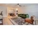 Spacious living room with an open floor plan, leading into the dining area and a view of the laundry at 4768 Tangerine Ave # 4768, Winter Park, FL 32792