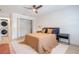 Main bedroom with ensuite bathroom, closet, and ample natural light at 4768 Tangerine Ave # 4768, Winter Park, FL 32792