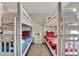 Fun ' bedroom with bunk beds and Disney-themed bedding at 4981 Windermere Ave, Kissimmee, FL 34746