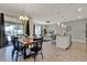 Open floor plan combines the dining, living, and kitchen areas, creating a seamless and inviting atmosphere at 4981 Windermere Ave, Kissimmee, FL 34746