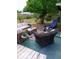 Cozy outdoor living space features stylish patio furniture and a relaxing backyard view at 505 Oak Dr, Tavares, FL 32778