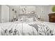 Comfortable primary bedroom featuring modern decor, a plush bed, and ample natural light at 505 Oak Dr, Tavares, FL 32778