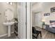 Well lit half-bath featuring decor accessories at 5133 Citrus Leaf Blvd, Winter Garden, FL 34787