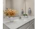 Bathroom vanity features sleek white countertop with ample counter space at 5133 Citrus Leaf Blvd, Winter Garden, FL 34787