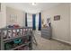 bedroom with playful decor, including a loft bed, and grey dresser at 5133 Citrus Leaf Blvd, Winter Garden, FL 34787