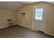 Loft featuring neutral paint, carpet, air conditioner, and access to a deck at 600 Lake Butler Ave, Osteen, FL 32764