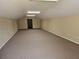 Expansive bonus room offers carpeted floors, neutral walls, and convenient closet access at 600 Lake Butler Ave, Osteen, FL 32764