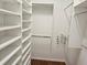 Walk in closet featuring multiple shelving and clothes bars at 600 Lake Butler Ave, Osteen, FL 32764