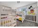 bedroom with bunk beds and a themed wall at 661 Drop Shot Dr, Davenport, FL 33896