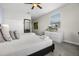 Comfortable bedroom with a queen bed, a dresser, and a TV at 661 Drop Shot Dr, Davenport, FL 33896
