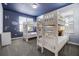bedroom with bunk beds and a themed wall at 661 Drop Shot Dr, Davenport, FL 33896