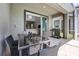 Outdoor patio with dining table and a grill at 661 Drop Shot Dr, Davenport, FL 33896
