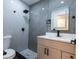 Clean bathroom with marble shower and a vanity at 722 Carlson Dr, Orlando, FL 32804